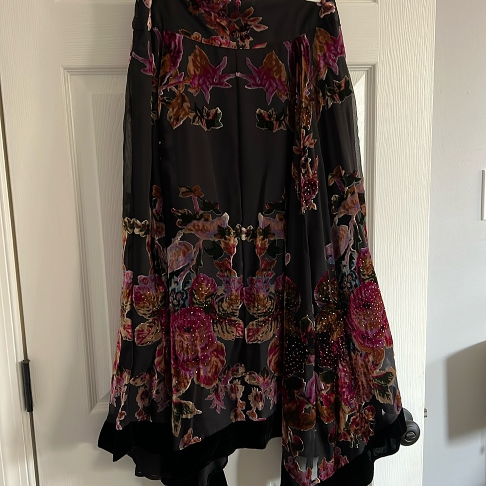 Women’s long skirt. Beautiful details of purple flowers. Never worn